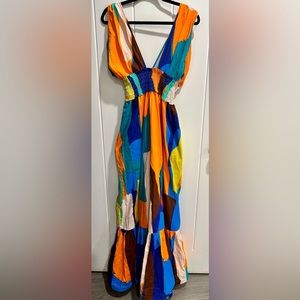maxi dress, multicolored, new with tags never worn, crossed at the back